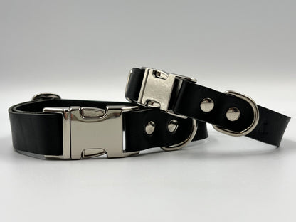 Luxury black leather dog collar with silver hardware, crafted from premium Italian leather, elegant design for discerning dogs.